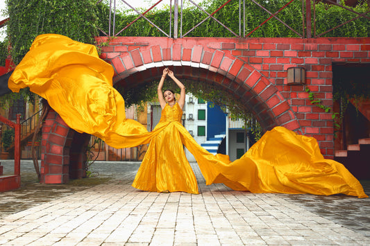 Yellow Two Tail gown for Prewedding Shoot